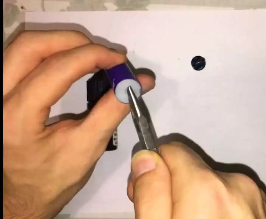 Bottom part transparent plastic blue gently remove it