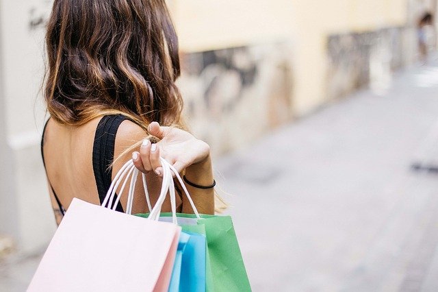Girl waiting for sale in groceries