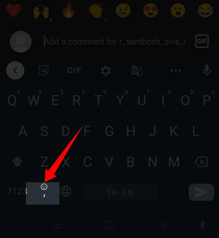 Instagram comment - phone keyboard smiley face